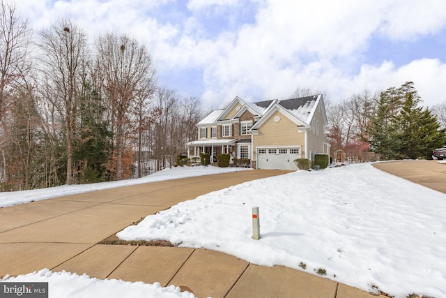 view of front of property with a garage