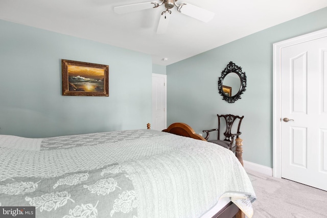 bedroom featuring ceiling fan and carpet floors