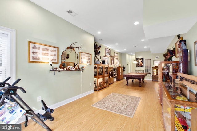 recreation room featuring hardwood / wood-style flooring and billiards