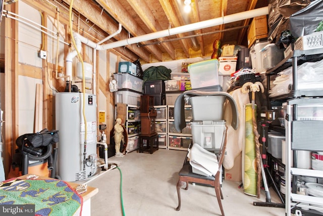 utility room featuring water heater