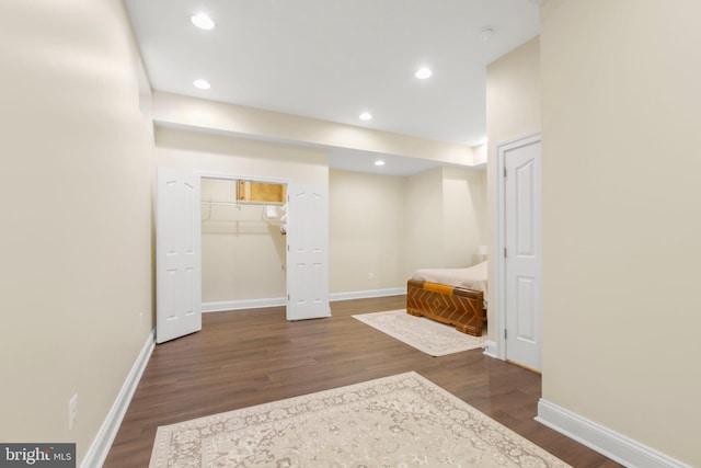 interior space with dark hardwood / wood-style flooring