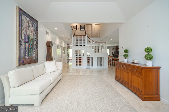 living room with lofted ceiling