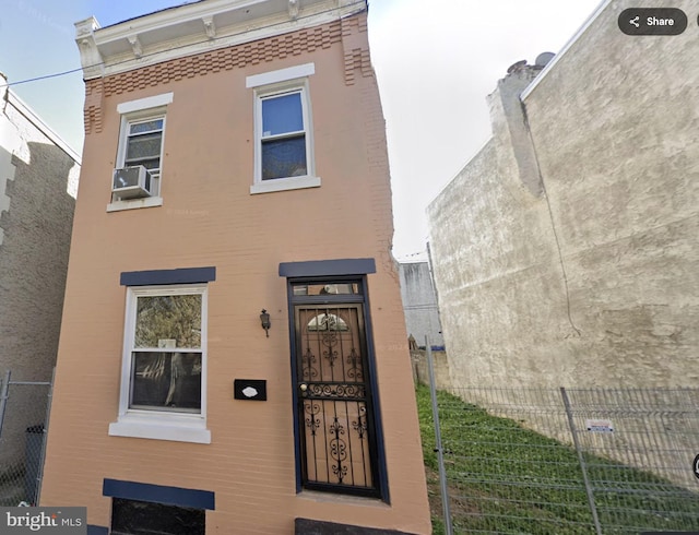 view of front of house with cooling unit