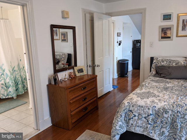 bedroom featuring wood-type flooring