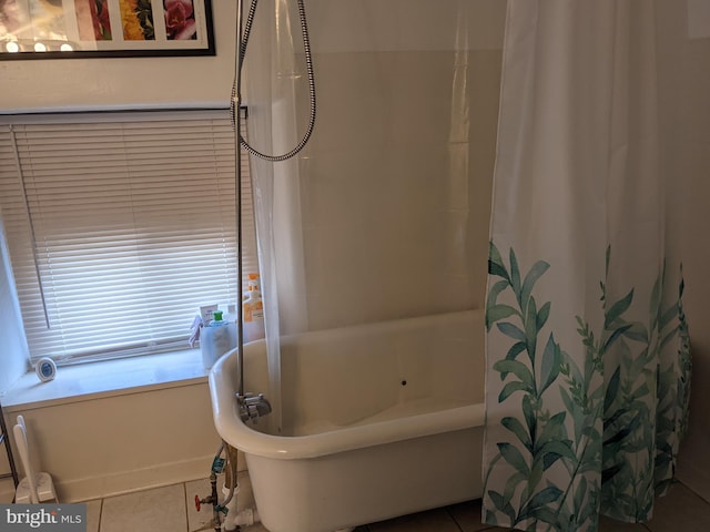 bathroom with tile patterned flooring