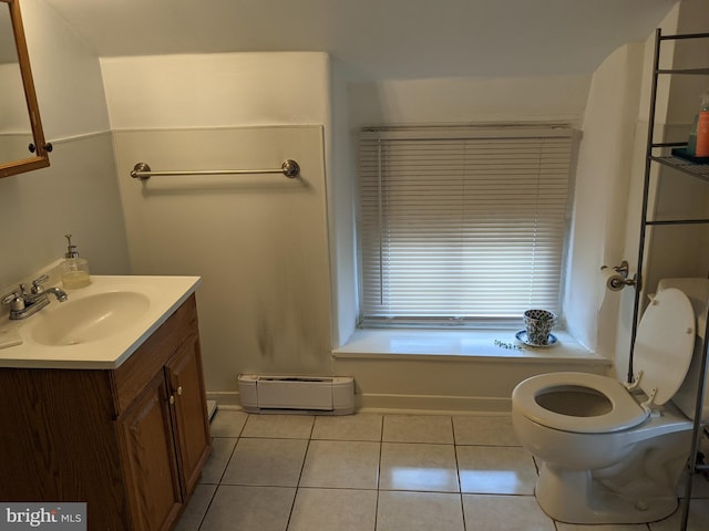 bathroom with tile patterned flooring, vanity, toilet, and baseboard heating