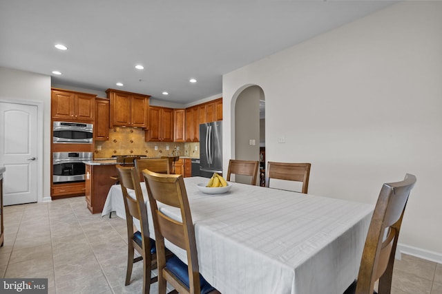 view of tiled dining space