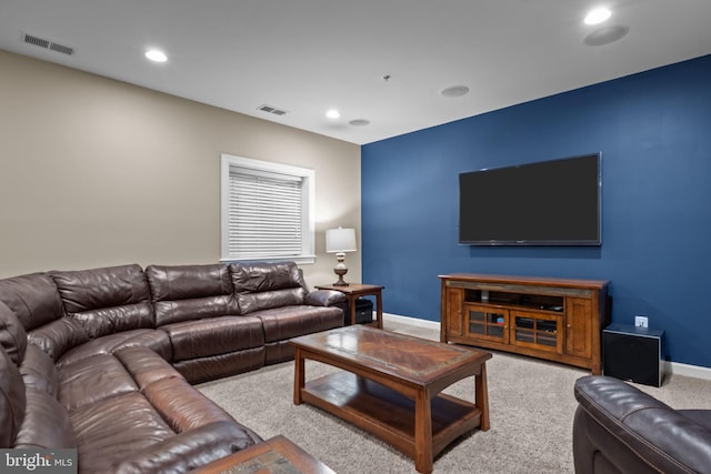 living room featuring light carpet