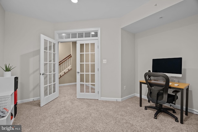 office space featuring french doors and light carpet