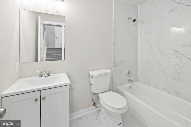 full bathroom with vanity, toilet, and tiled shower / bath