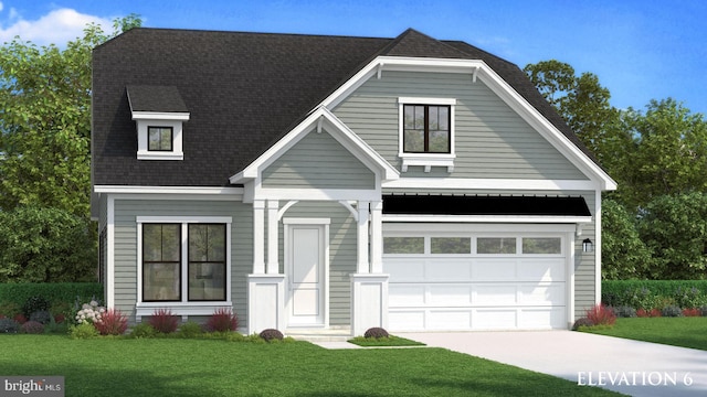 view of front facade with a garage and a front lawn