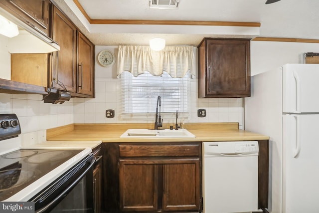 kitchen featuring white appliances, ventilation hood, sink, ornamental molding, and tasteful backsplash