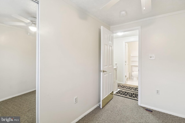 unfurnished bedroom with carpet flooring, ceiling fan, and ornamental molding