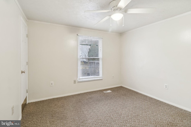 unfurnished room featuring carpet flooring, ceiling fan, and crown molding