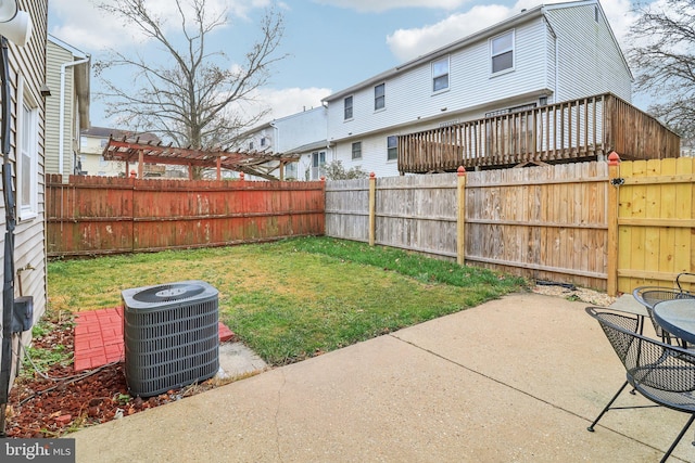 view of yard with a patio area and cooling unit