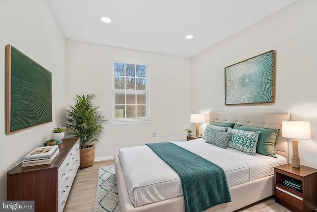 bedroom with light hardwood / wood-style flooring