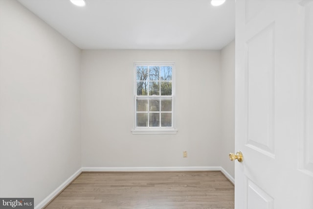 unfurnished room featuring light wood-type flooring