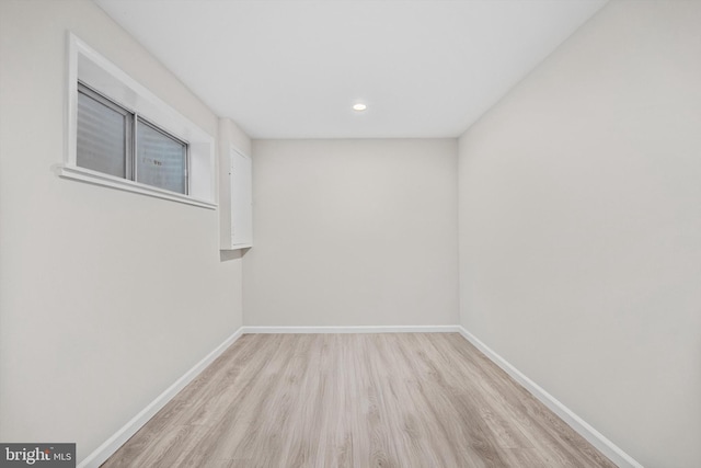 spare room featuring light hardwood / wood-style flooring