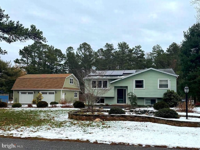 view of front of house with solar panels