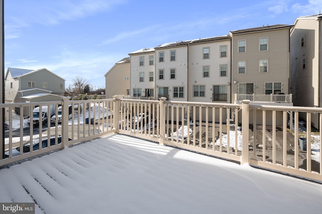 view of snow covered deck