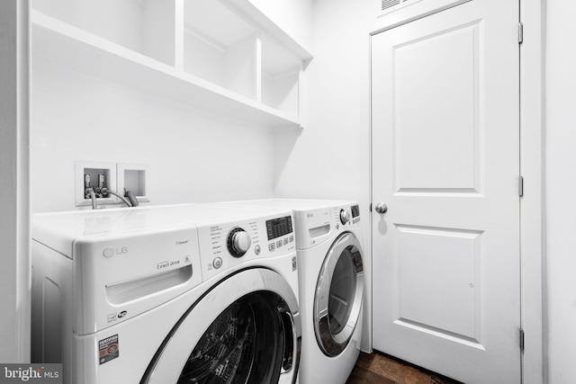 washroom featuring independent washer and dryer