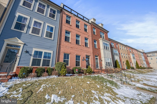 view of snow covered property