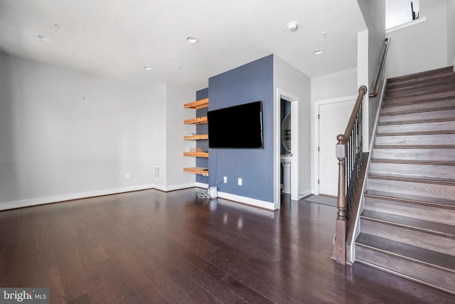 living room featuring dark hardwood / wood-style floors