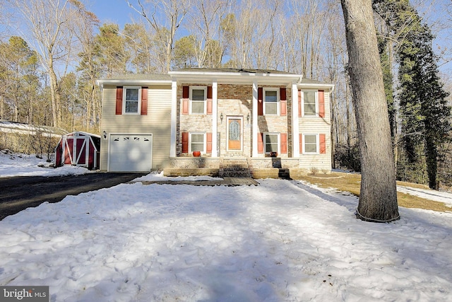 bi-level home featuring a garage