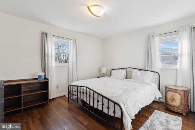 bedroom featuring dark hardwood / wood-style floors