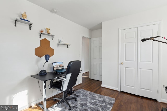 office with dark hardwood / wood-style floors