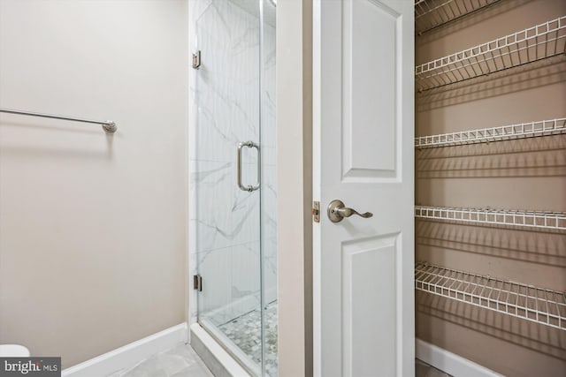 bathroom featuring walk in shower