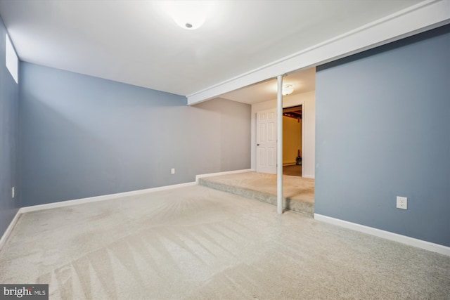 basement with carpet flooring