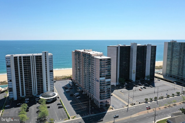 drone / aerial view with a view of the beach and a water view