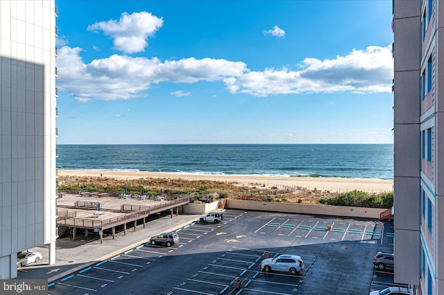 property view of water featuring a beach view