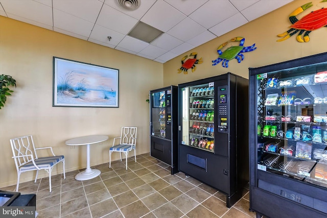 game room with tile patterned flooring