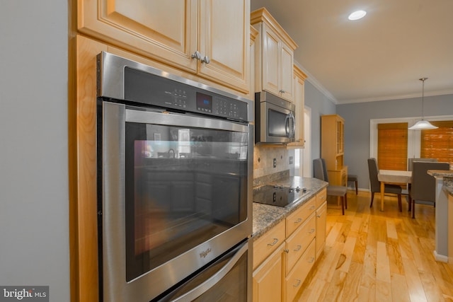 kitchen with appliances with stainless steel finishes, ornamental molding, light stone countertops, decorative backsplash, and decorative light fixtures