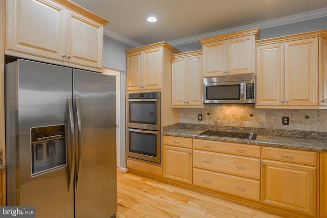 kitchen with appliances with stainless steel finishes, backsplash, ornamental molding, light brown cabinetry, and light wood-type flooring