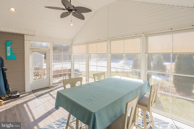 sunroom / solarium with vaulted ceiling and ceiling fan