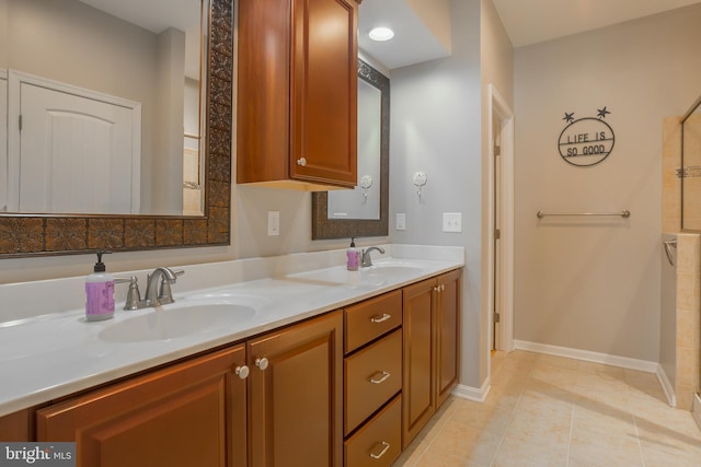 bathroom with vanity and tile patterned floors