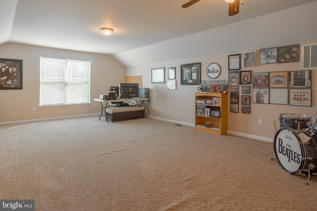 office space with lofted ceiling, carpet floors, and ceiling fan