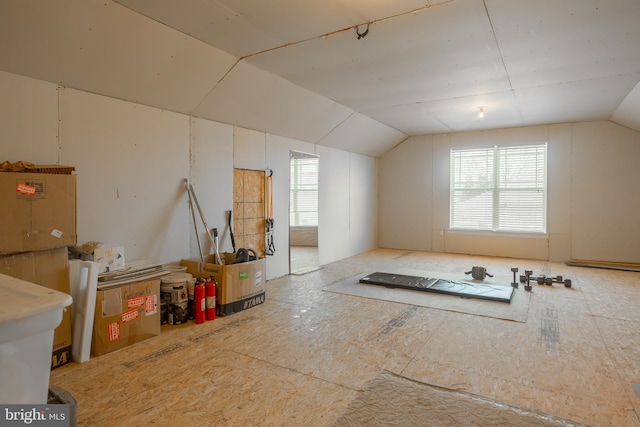 additional living space with lofted ceiling