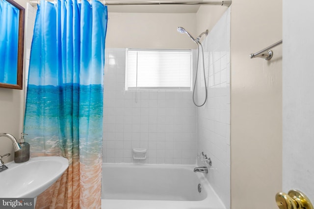 bathroom featuring sink and shower / tub combo