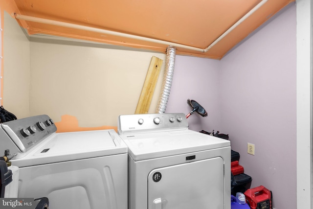 laundry area with washer and dryer