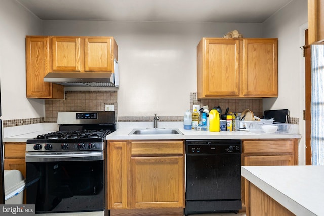 kitchen with sink, stainless steel range with gas cooktop, decorative backsplash, and dishwasher