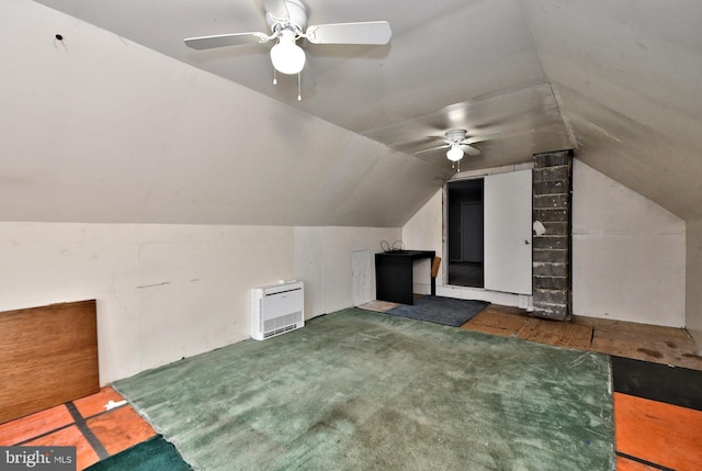 bonus room with ceiling fan, carpet floors, and lofted ceiling