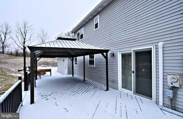 snow covered deck with a gazebo