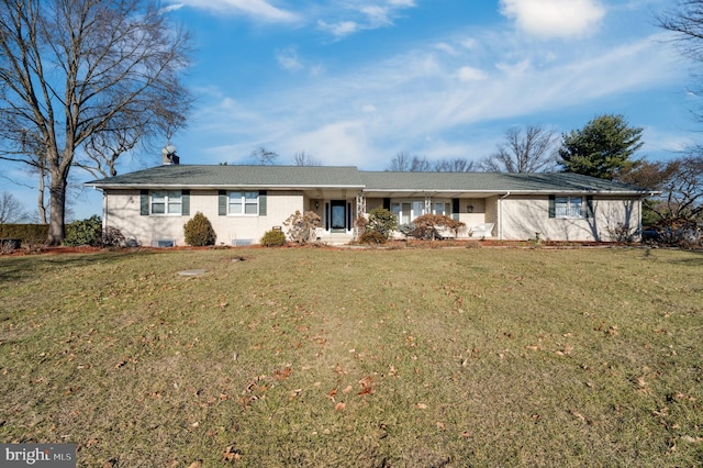 ranch-style home featuring a front yard