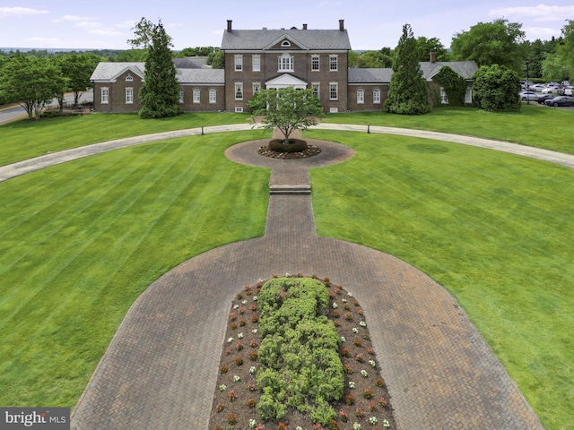 view of front of home with a front lawn