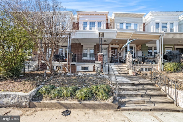 view of property featuring a porch