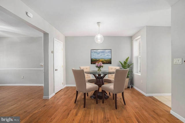 dining room featuring light hardwood / wood-style flooring